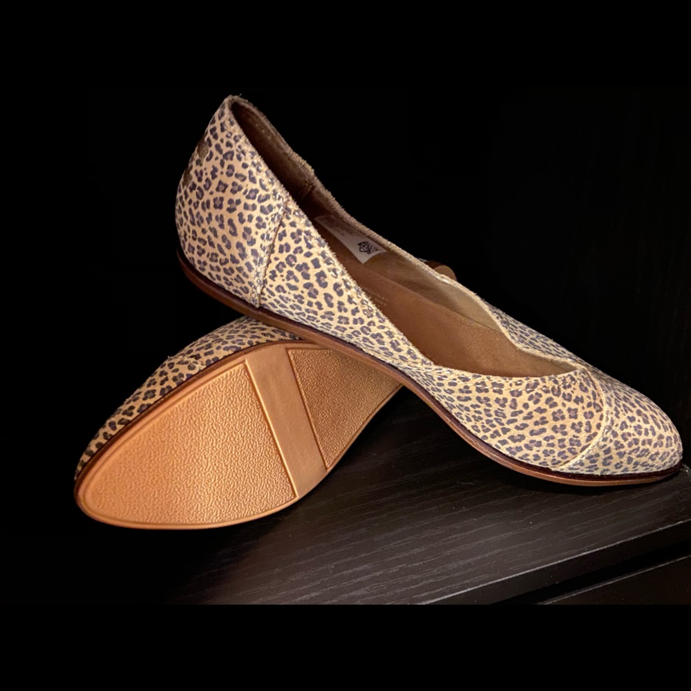 Tom’s animal print flats.